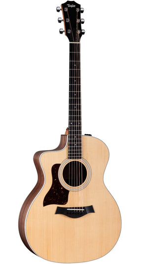 Acoustic guitar with a Taylor logo on a white background